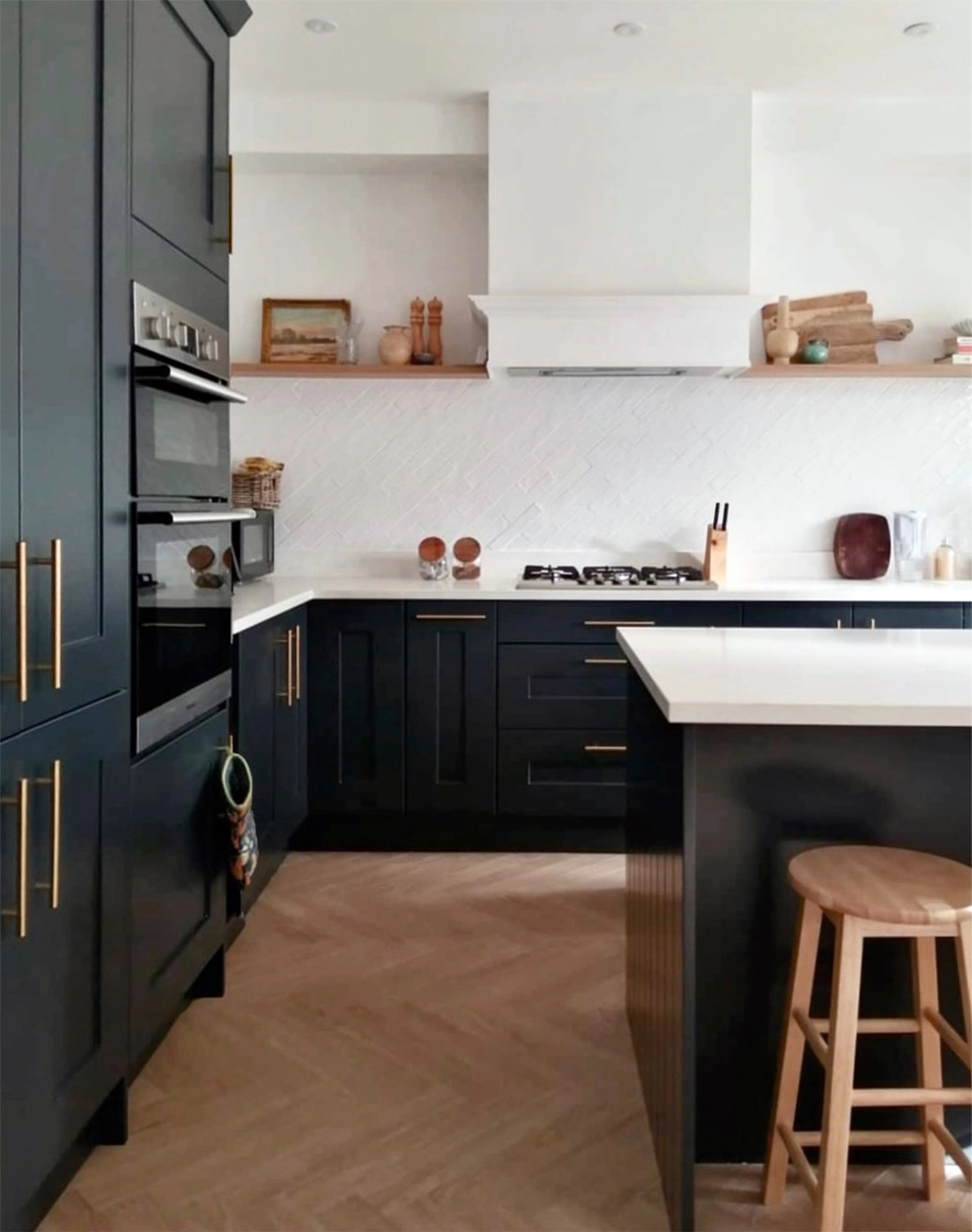 Modern shaker black and white kitchen with natural accents - design by First Sense Interiors